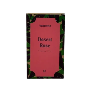 Kolorowe opakowanie herbaty ziołowej Teasome Desert Rose 50 g z różową etykietą i wzorem liści, dostępne w sklepie z kawą i herbatą