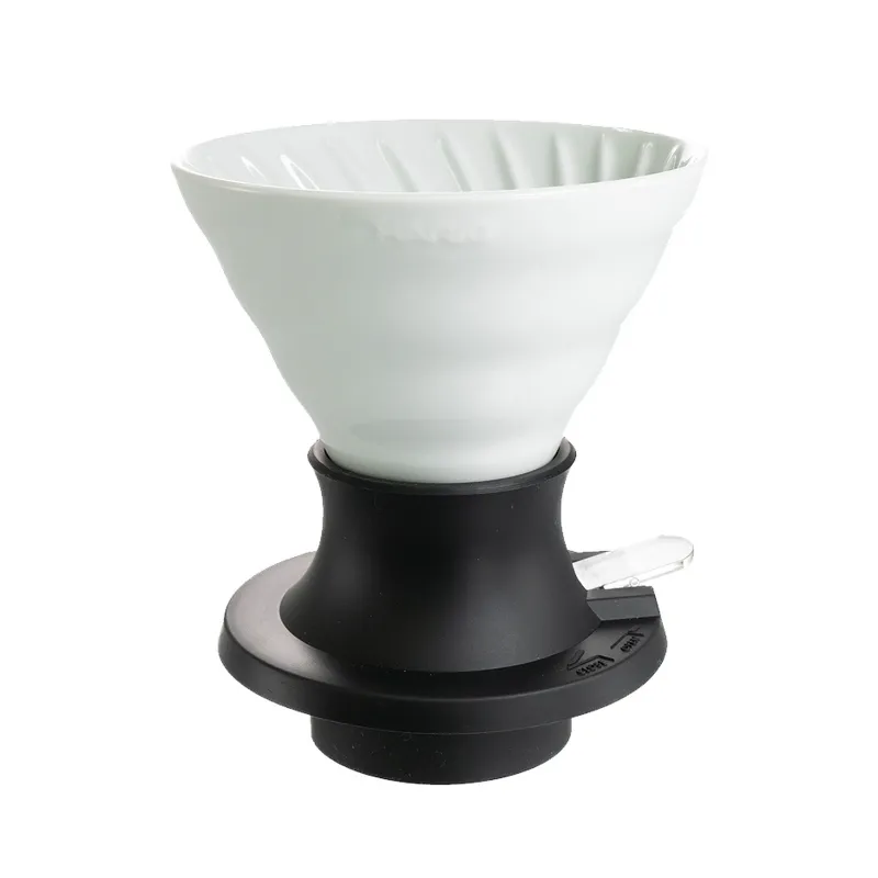 Ceramiczny filtr do kawy z elegancką podstawką, idealny do parzenia świeżej kawy w domowym zaciszu. Dzięki ergonomicznemu kształtowi i wysokiej jakości materiałom zapewnia doskonałe rezultaty, idealnie wydobywając aromaty i smaki.